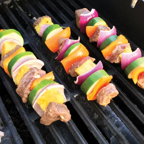 Grilled kabobs on a grill.